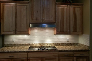 Inspiration for a contemporary kitchen remodel in Seattle with tile countertops and white backsplash