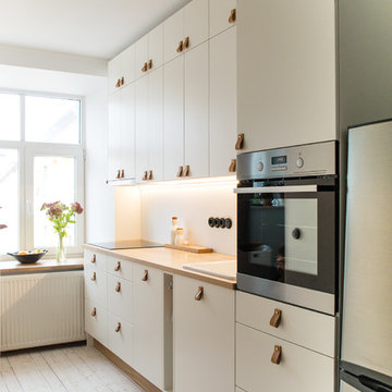 Scandinavian minimalistic white kitchen