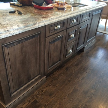 Schuler Cabinetry - Sheffield Door in Divinity Paint and Eagle Rock Island