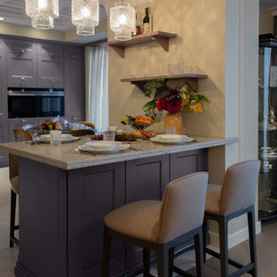 Design ideas for a large eclectic l-shaped open plan kitchen in Other with a double-bowl sink, louvered cabinets, purple cabinets, quartz benchtops, beige splashback, stone slab splashback, coloured appliances, ceramic floors, a peninsula, beige floor and beige benchtop.