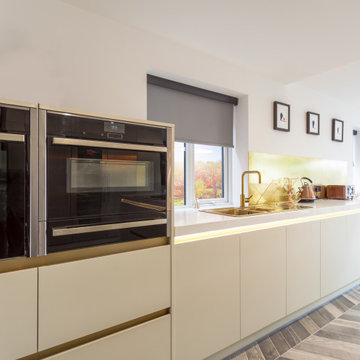 Shaded White and Brass Contemporary Kitchen