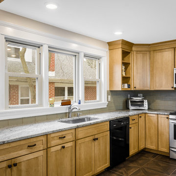 Shaker Maple cabinetry with Sienna Beige Granite top.