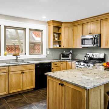 Shaker Maple cabinetry with Sienna Beige Granite top.