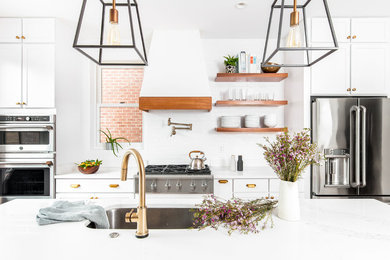 Small farmhouse single-wall eat-in kitchen photo in DC Metro with a single-bowl sink, shaker cabinets, white cabinets, quartzite countertops, white backsplash, subway tile backsplash, an island and white countertops