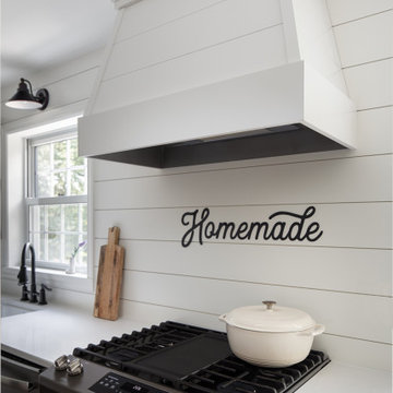 Shiplap hood and gas range with a griddle