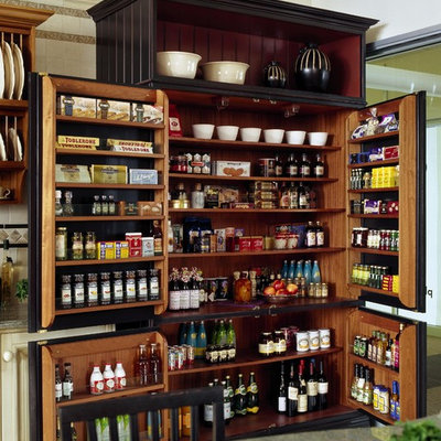 Inspiration for a timeless kitchen pantry remodel in Boston with recessed-panel cabinets
