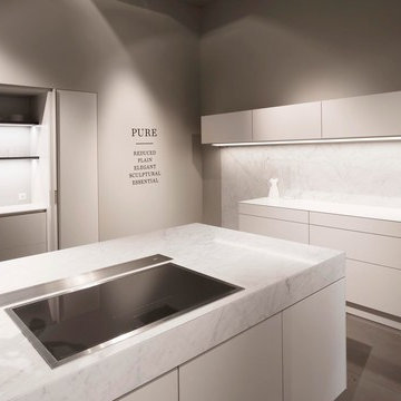 SieMatic PURE Design - Minimalist kitchen with hide a way pantry