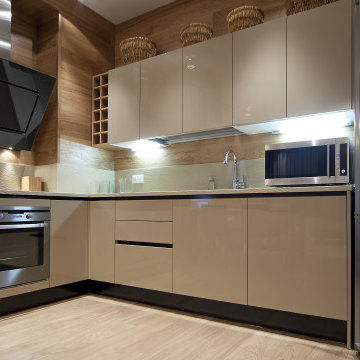 Slab Cabinet Installation With New Appliances and Backsplash