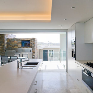 Foto di una cucina minimalista con ante lisce