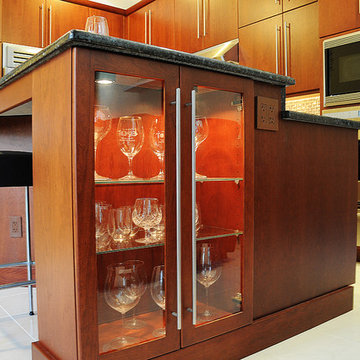 Sleek cherry SubZero Wolf Kitchen