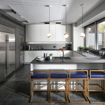 Sleek kitchen of grays and white
