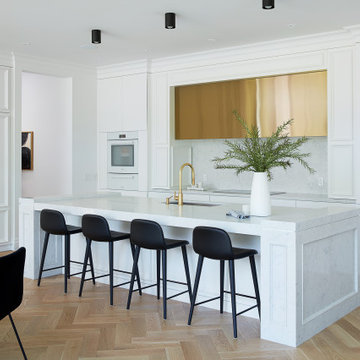 Sleek, White, Quartz-Embellished Kitchen