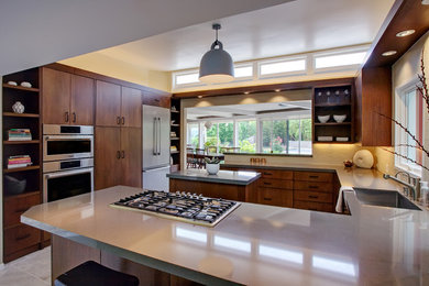 1950s u-shaped ceramic tile eat-in kitchen photo in San Francisco with a single-bowl sink, flat-panel cabinets, medium tone wood cabinets, quartz countertops, ceramic backsplash, stainless steel appliances and an island