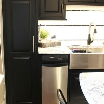 Small Island Kitchen with Black Painted Cabinetry in Taylor Ridge, IL