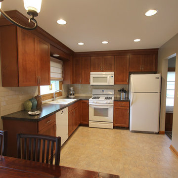 Small Kitchen Redesign with Maple Cabinets and Laminate Countertops