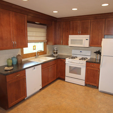 Small Kitchen Redesign with Maple Cabinets and Laminate Countertops