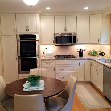 Small White "L" Shaped Kitchen in Naperville by Adam Hartig AKBD