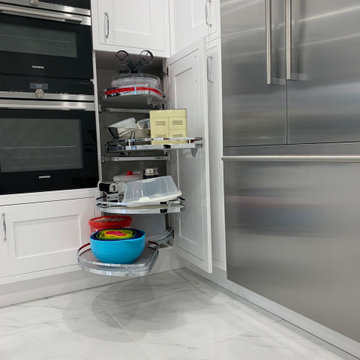 Smooth painted white inframe kitchen - Tall corner storage