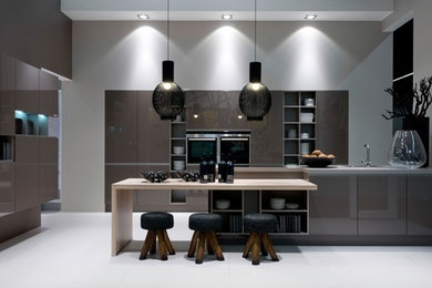 Mid-sized trendy eat-in kitchen photo in Miami with flat-panel cabinets and brown cabinets