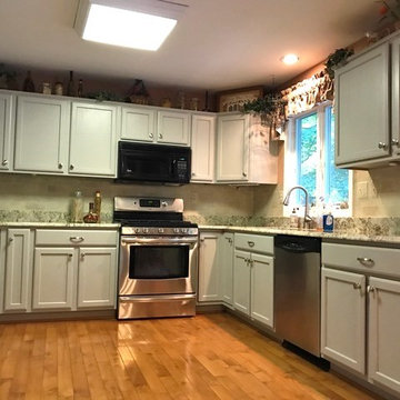 Soft Gray Kitchen Cabinets with Faux Brick Backsplash