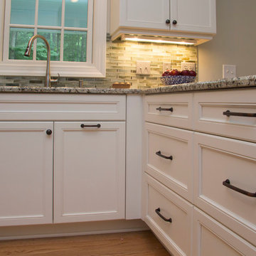 Soft White Kitchen with Blue and Green Accents