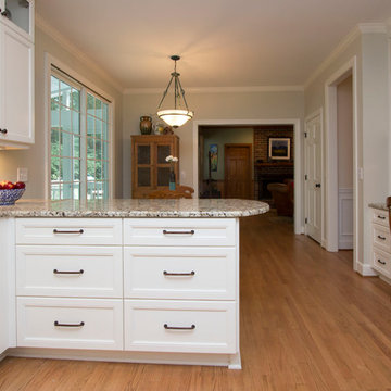 Soft White Kitchen with Blue and Green Accents