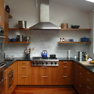solid cherry cabinets, marble subway tile backsplash, stainless steel appliances