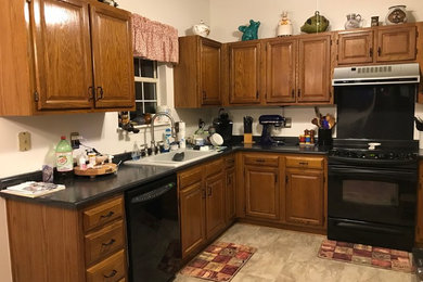 Medium sized traditional u-shaped kitchen/diner in Charleston with raised-panel cabinets, medium wood cabinets, granite worktops and no island.