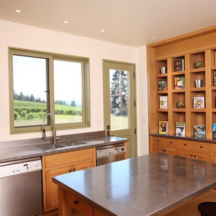 Inspiration for a country kitchen in Portland with an integrated sink, zinc benchtops, shaker cabinets, medium wood cabinets and stainless steel appliances.