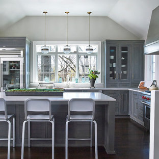 Large rustic eat-in kitchen appliance - Large mountain style l-shaped dark wood floor eat-in kitchen photo in New York with an undermount sink, shaker cabinets, distressed cabinets, quartzite countertops, gray backsplash, stone slab backsplash, stainless steel appliances and an island