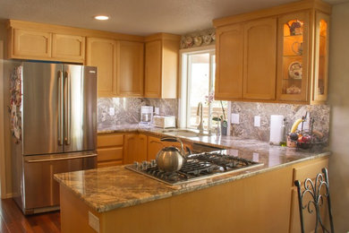 Kitchen - modern kitchen idea in Seattle with granite countertops