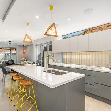 Spacious Kitchen with Yellow Features