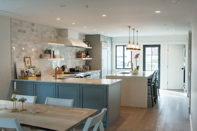Large transitional l-shaped eat-in kitchen photo in Vancouver with an undermount sink, shaker cabinets, quartz countertops, gray backsplash, stone tile backsplash, paneled appliances and an island