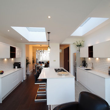 Split level ceiling and rooflight maximises light and space