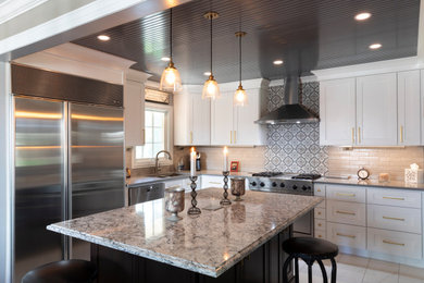 Eat-in kitchen - mid-sized transitional u-shaped marble floor, white floor and tray ceiling eat-in kitchen idea in Chicago with an undermount sink, shaker cabinets, white cabinets, quartz countertops, gray backsplash, brick backsplash, stainless steel appliances, an island and gray countertops