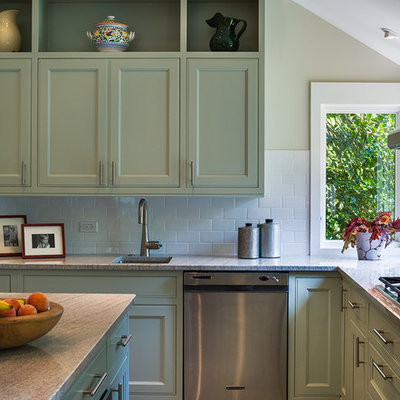 Eat-in kitchen - small farmhouse l-shaped travertine floor eat-in kitchen idea in Philadelphia with beaded inset cabinets, green cabinets, an island, an undermount sink, marble countertops, white backsplash, subway tile backsplash and stainless steel appliances