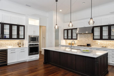 Transitional kitchen photo in Jacksonville with an island