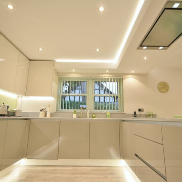 Springfield, Chelmsford - Acrylic Gloss handless kitchen in Ivory and Stone Grey