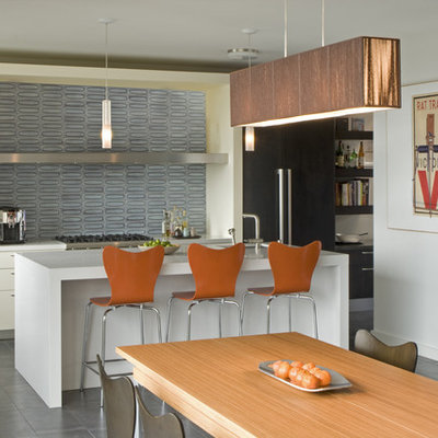 Eat-in kitchen - modern eat-in kitchen idea in San Francisco with stainless steel appliances, quartz countertops, blue backsplash, glass tile backsplash, flat-panel cabinets and white cabinets