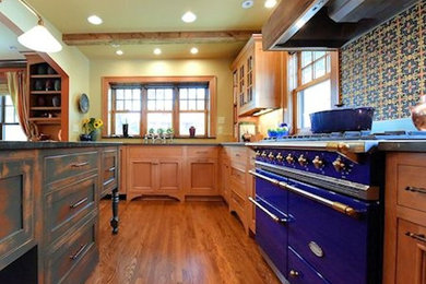 Large cottage u-shaped light wood floor open concept kitchen photo in Minneapolis with flat-panel cabinets, light wood cabinets, quartz countertops, multicolored backsplash, ceramic backsplash, colored appliances and an island