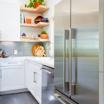 Stainless Steel Appliance in White Contemporary U-Shaped Kitchen