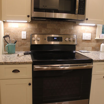 Stainless Steel appliances with linen cabinets