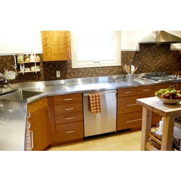 Stainless steel countertop with a corner sink by Ridalco