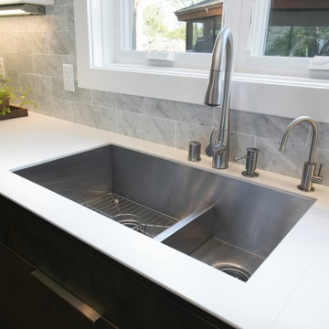Stainless Steel Integrated Sink and Taps.