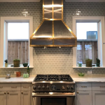 Stainless Steel Range Hood with Bronze Strapping