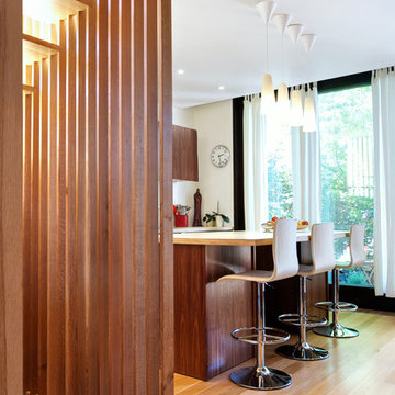 Stair Slats + Walnut Kitchen