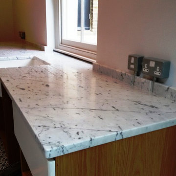 Stoke Newington Industrial kitchen in Carrara Gioia honed marble