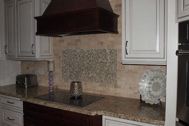 Transitional kitchen photo in Other with granite countertops, beige backsplash and stone tile backsplash
