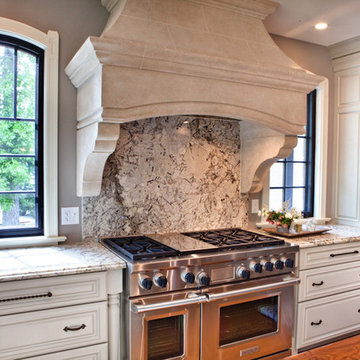 Stone Range Hood with Granite Backsplash Kitchen Renovation St. Louis, MO