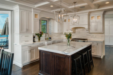 Large transitional u-shaped dark wood floor open concept kitchen photo in Detroit with shaker cabinets, white cabinets, marble countertops, white backsplash, matchstick tile backsplash, an island, an undermount sink and white appliances